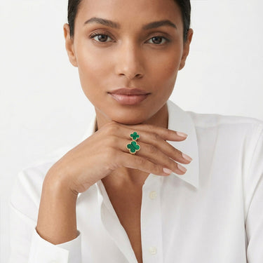 Green Clover Between The Finger Ring