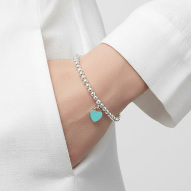 Return To T Blue Heart Tag Bead Bracelet