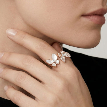 Two Butterfly Between The Finger Pearl Ring